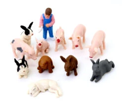 12 Figurines Ferme : Lapins, Porcelets Et Fermière Dans Un Tube De Rangement